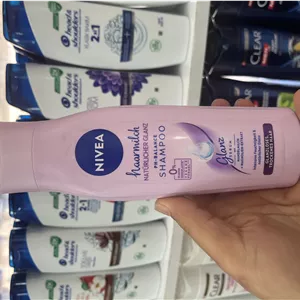 شامپو شیر مو نیوآ (NIVEA) مدل Haarmilch حاوی شیر بادام و عصاره مگنولیا حجم ۲۵۰ میلی‌لیتر (اصل آلمان)