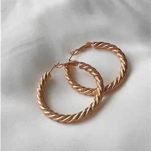 گوشواره حلقه ای مدل دامله پیچ برند ژوپینگ و مشابه طلا در فروشگاه رخسار سیلور