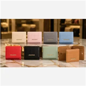 کیف پول زنانه چرم طبیعی مدل 067 با جای کارت و مدارک ابعاد 13 در 10 سانتیمتر
