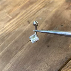 پیرسینگ ناف قلب بالدار