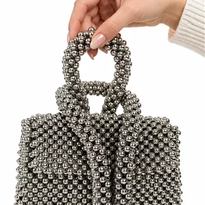 کیف زنانه دسته کرواتی جنس مروارید رنگ نقره ای