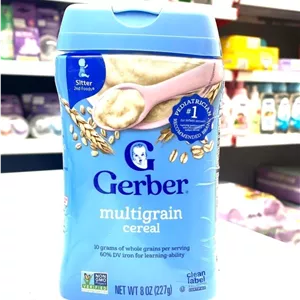 غذای کمکی ( سرلاک) پروبیوتیک بدون شیر غلات گندم و جودوسر با توت فرنگی و موز حاوی آهن گربرGerber مناسب4 ماه وزن