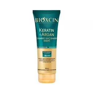 کرم ترمیم‌کننده مو بیوکسین حاوی کراتین و آرگان Bioxcin Keratin & Argan Repairing Hair Care Cream