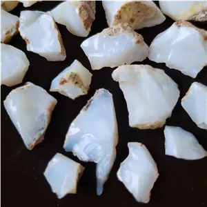 سنگ قیمتی راف اپال مرواریدی (Pearl Opal)؛ 100% اصل و طبیعی | درخشش سفید صدفی متمایل به آبی | واردکننده مستقیم با قیمت های ویژه