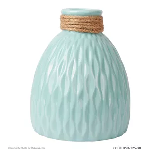 گلدان طرحدار سرامیکی آبی لبه کنفی