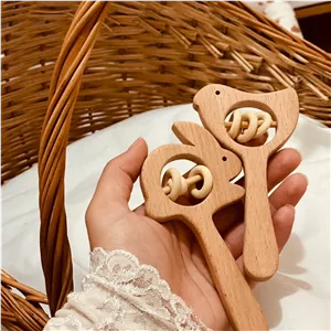 جغجغه طرح خرگوش و جوجه (پرنده) دسته دار چوبی چوب راش درجه یک