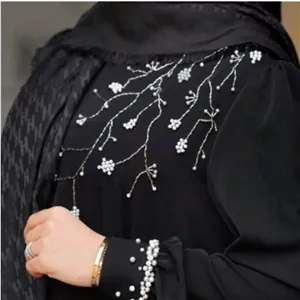 مانتو عبایی جواهر دوزی کرپ الاسود مشکی مدل مهسا ماه شو مزون 