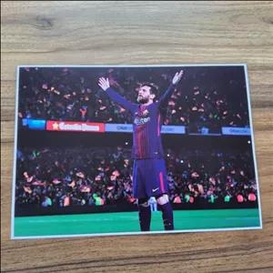 پوستر مسی خوشحالی بعد از گل با لباس بارسلونا