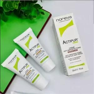 کرم روز اکتی پور نوروا کرم رنگی و ضد جوش باخاصیت پوشانندگی بالا و بافتی سبک از بیوتی ماه منیر مدل 48650