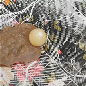 گوی سنگ کلسیت زرد کوچیک معدنی کد 1
