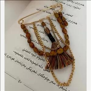 سنجاق سینه (ده رزیله)