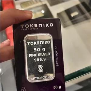 شمش نقره 50 گرمی توکنیکو شرکتی جهت سرمایه گذاری عیار 999/9 حک خورده با فاکتور ورق بزنید لطفا  
