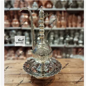 آفتابه لگن مسی تخت قلم زنی کروم آفتابه و لگن نقره ای سفید طرح دار  زنجان 