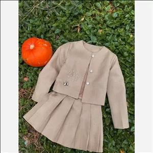 لباس دخترانه کت و دامن جنس شنل کشمیر آستر کشی  سایز هفت سال 