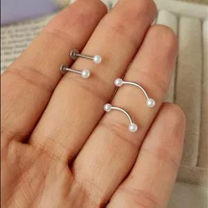 پیرسینگ گوش و ابرو مرواریدی