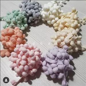 پوم پوم ریسه ای یا نوار منگوله دار(خارجی)\nدر 8رنگ ملایم و زیبا (یک متری)