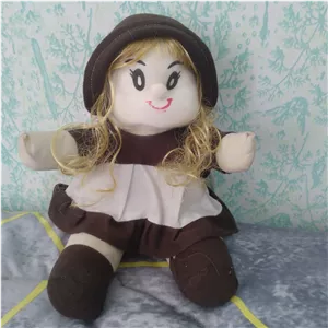 عروسک نانسی نشسته با لباس قهوه ای دامن دار 