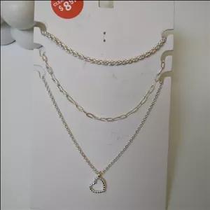 گردنبند سه لاین نقره ای با اویز قلب همراه زنجیر طنابی