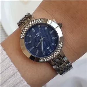 ساعت مچی زنانه و دخترانه سیتیزن دور نگین بدنه و بند فلزی استیل اصلی و موتور اصلی ژاپن با گارانتی یکساله موتور 