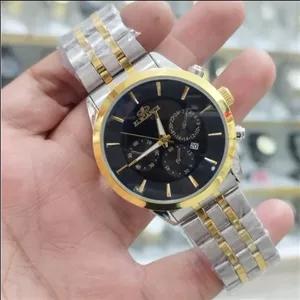 ساعت الگانس مردانه تقویم دار طرح 3 موتور استیل رنگ ثابت ضد آب همراه با جعبه رایگان و باتری اشانتیون