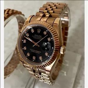 ساعت مچی مردانه رولکس دیت جاستRolex datejust  موتور ژاپن تقویم دار رنگ رزگلد ساعت عبدی بند استیل ساعت ست موجوده 