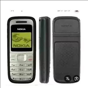 گوشی موبایل نوکیا مدل 1200 اصلی دوسیم کارت جنس کیفیت درجه 1 صفر پلمپ آکبند ریجستری شده با کد فعالسازی 