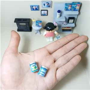 مینیاتوری شیر خشک و پستونک شیشه ای دو رنگ صورتی و آبی