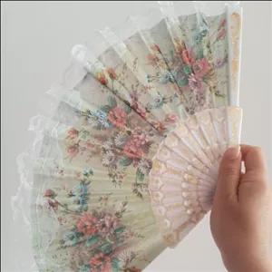 باد بزن،بادبزن دستی موجود در دورنگِ سفید و مشکی طرح دار