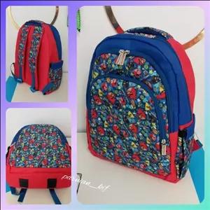 کوله پشتی دوره ابتدایی برزنت پشت فوم طرح پرندگان خشمیگن قرمز