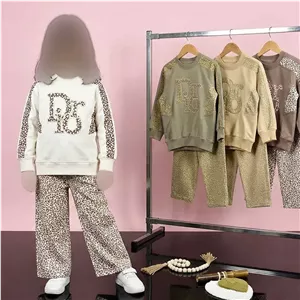 ست دخترانه بلوز دورس و شلوار کتان بگ طرح dior کد 11188