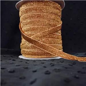 روبان مخمل شاین یک سانتی،زردربان مخمل زری دارروبان شاینروبان زری دار.