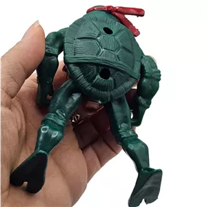فیگور ناب سل مدل لاک پشت های نینجا طرح مایکل آنجلو کد NINJATURTLES NAAB003 ارتفاع 12 سانتیمتر