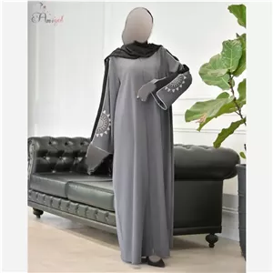 مانتو عبایی خورشید کرپ ندا اماراتی گلدوزی شده دکمه مخفی سایز بزرگ
