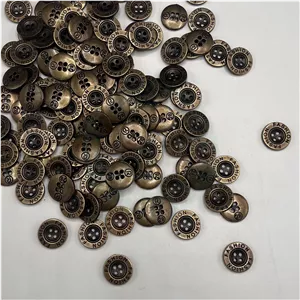 دکمه طرح فلز 4سوراخ رنگ زرد قلم سایز 28 (بسته 500 عددی)