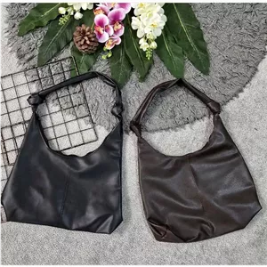 کیف بند گره ای چرمی سبک و جادار رنگ مشکی و موکا