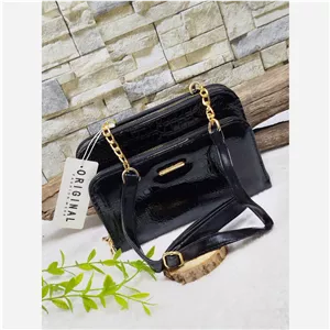کیف زنانه پاسپورتی مجلسی جنس ورنی 