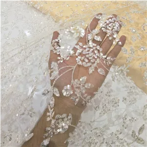 پارچه تور کره ای پولکدوزی نامرئی و اکلیلی،کیفیت عالی،نرم و لطیف ،مناسب مجلسی،بلوز،تونیک،شومیز،لباس محلی،عرض1 40