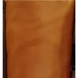 پارچه مموری نارنجی مناسب کاپشن و بارانی