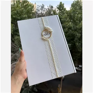 دفتر بله برون و عقد با رینگ طلایی و دیزاین مروارید و تگ تو مرا جان و جهانی ،دفترعقد ،دفتر بله برون ،دفتر ازدواج