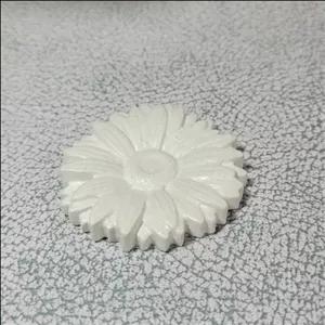 مجسمه سنگی گل بابونه از پودر سنگ هنری الفا 