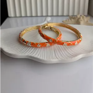 دستبند زنانه میناکاری نارنجی طرح گل