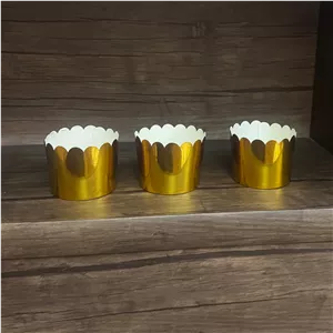  کاغذ کاپ کیک لیزری طلایی قطر بالا 7 قطر کف 6 عمق 5 سانت،قیمت یک عدد،یک سری خمیدگی دارند با تخفیف