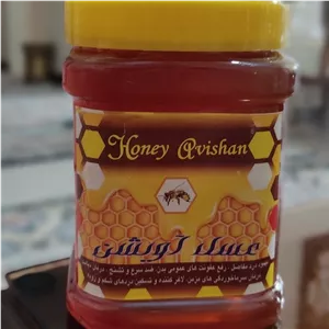 عسل آویشن طبیعی همراه با برگه آزمایش