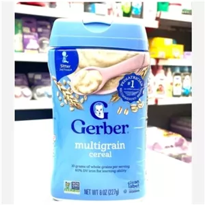غذای کمکی ( سرلاک) پروبیوتیک بدون شیر غلات گندم و جودوسر با توت فرنگی و موز حاوی آهن گربرGerber مناسب4+ماه وزن