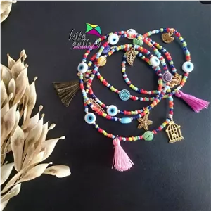 دستبند دخترانه چند دور رنگی رنگی منگوله دار