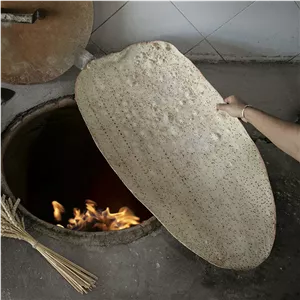 نان خشکه تنوری پرکنجدنان سنتی اصفهان