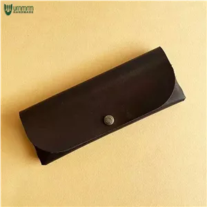 کیف چرمی مغار و چاقوی چوب تراشی