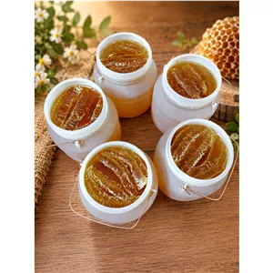 عسل طبیعی گون آویشن با برگه آزمایش