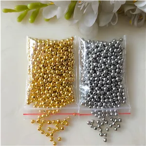مروارید پلاستیکی طلایی و نقره ای سایز 4 (در بسته 15 گرمی)