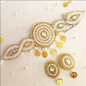 کمربند مجلسی زنانه مرواریدی نگینی طرح پیچک (پس کرایه)